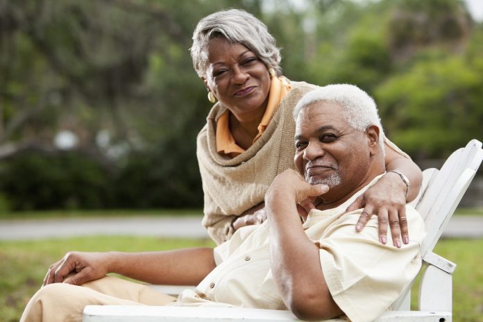 Senior African American couple Portrait of stylish senior African American couple. Focus on man (60s).