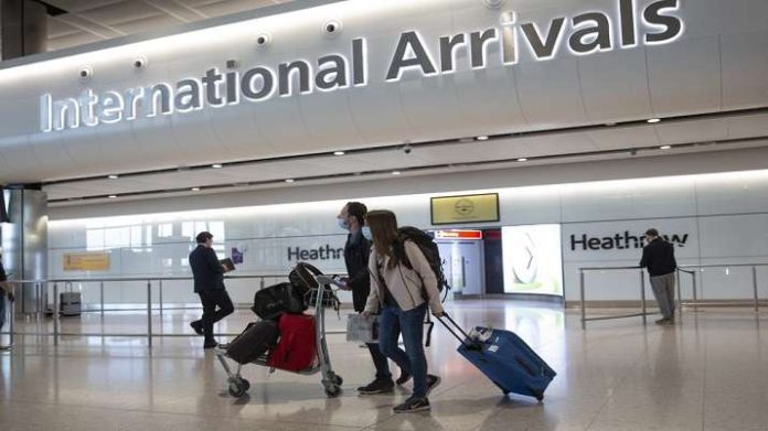 uk-covid-travel-1618846117 Airport