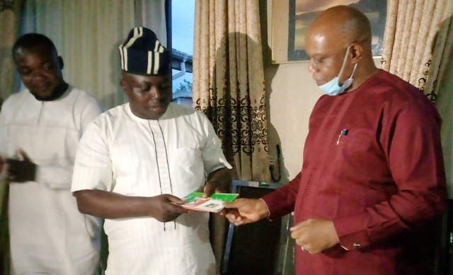 Amb-Ogar-Osim-l-receiving-LP-constitution-from-Prince-Favour-Reubenright Ogar Osim