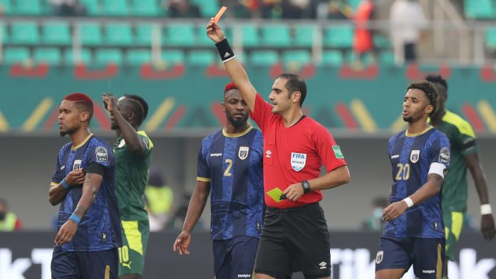 Referee_Lahlou_Benbraham_gives_red_card_sends_off_Erickson_Patrick_Andrade_of_Cape_Verde_during_the_2021_Africa_Cup_of_Nations_Afcon AFCON