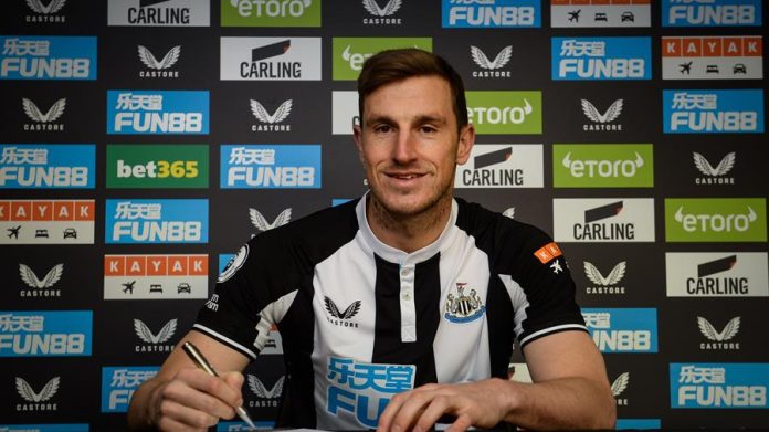 chris-wood-signs-contract Chris Wood