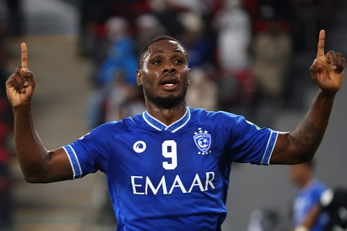 Hilal's forward Odion Ighalo reacts after scoring a goal during the 2021 FIFA Club World Cup football match between UAE's Al-Jazira and Saudi's Al-Hilal at Mohammed Bin Zayed stadium in Abu Dhabi on February 6, 2022. (Photo by Giuseppe CACACE / AFP) (Photo by GIUSEPPE CACACE/AFP via Getty Images)