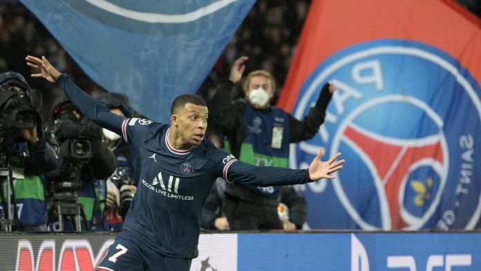 Kylian Mbappe with PSG flag 021622_0 Kylian Mbappe with PSG