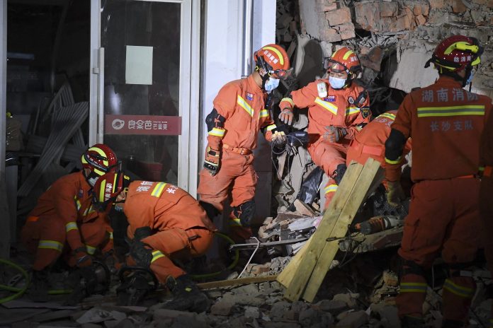 Police Arrest Nine After Building Collapses In Central China Police Arrest Nine After Building Collapses In Central China