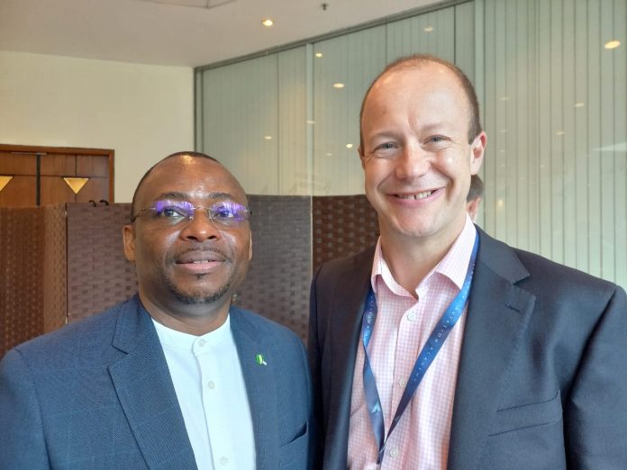 Commissioner Banjul Accord Group Accident Investigation Agency ( BAGAIA) Engineer Charles Irekefe Erhueh (left) with Prof. Graham Braithwaite (right), the Director of Transport Systems, Professor of Safety & Accident Investigation from Cranfield University at the International Accident Investigation Forum holding in Singapore.