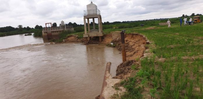 A typical eroded site within he Challawa River where ilegal miners are using to encroache sand (1) A typical eroded site within he Challawa River where ilegal miners are using to encroache sand