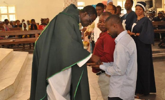 Catholic handshake Catholic handshake
