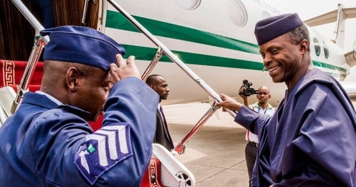 Osinbajo boarding a plane