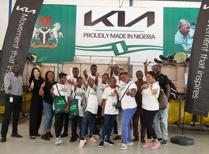 A group photograph of the students and staff of the Korea-Africa Foundation during the tour of the Kia Assembly Plant in Lagos