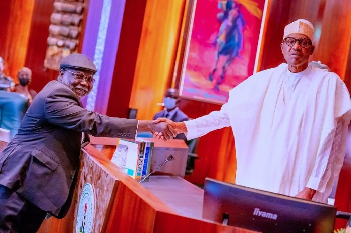 Buhari swears in Justice Ariwoola