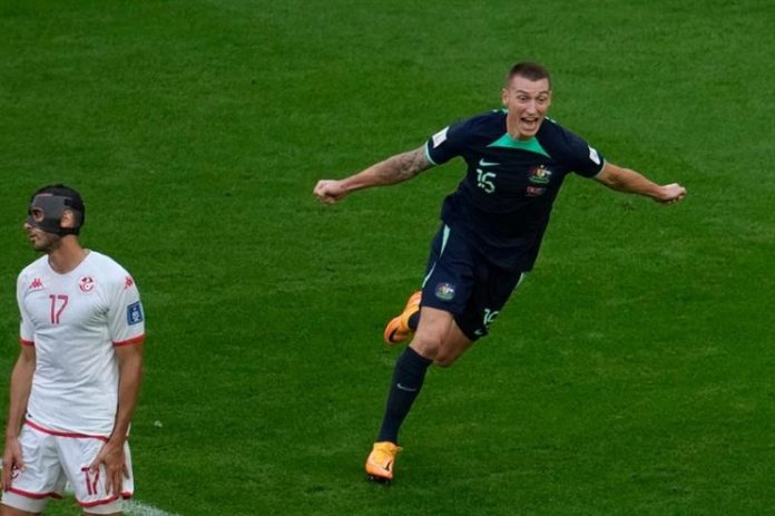 Australian Player jubilates after scoring against Tunisia