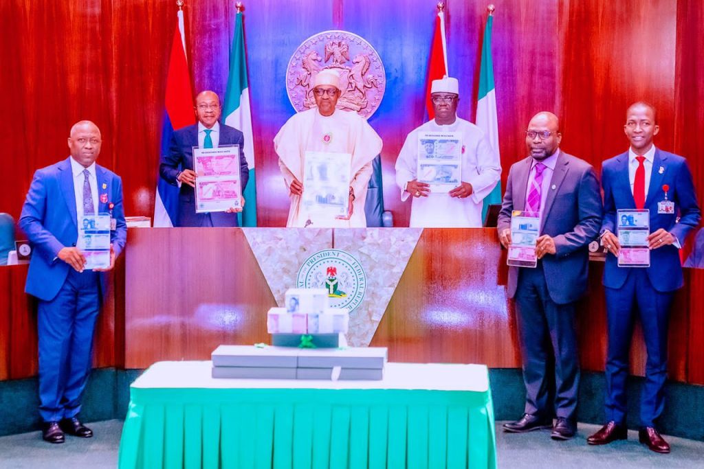 Buhari and team, New naira notes - THEWILL NEWS MEDIA
