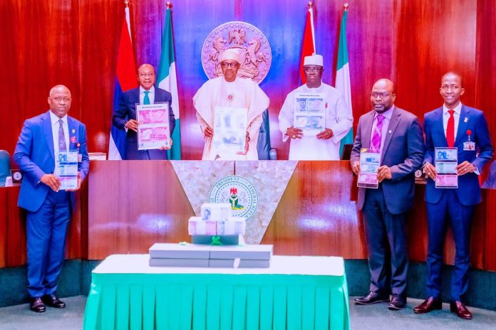 Buhari and team, New naira notes