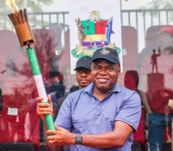 Gov. Diri with Torch of Unity