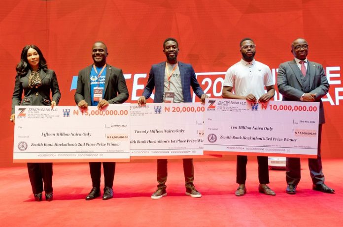 Group Managing Director/CEO, Zenith Bank Plc, Mr Ebenezer Onyeagwu (1st Right); Deputy Managing Director, Zenith Bank Plc, Dame (Dr) Adaora Umeoji, OON (1st Left); Founder/CEO, Foris Lab, Onuigbo John Chukwubuikem (2nd Left); Founder/CEO, Ecotutu, Babajide Oluwase (3rd Left); and Founder/CEO, Finva, Oluwatomisin Kolawole (2nd Right) during the presentation of cash prizes to the winners of the Hackathon at the Zenith Tech Fair 2.0 held at Eko Convention Centre, Eko Hotels & Suites, Victoria Island, Lagos, on Wednesday.