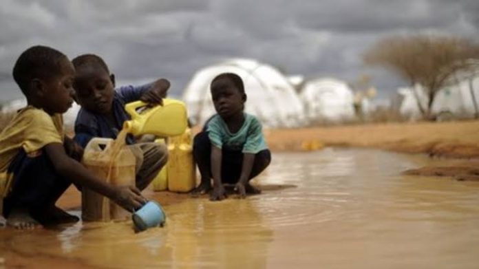 Kids drinking dirty water