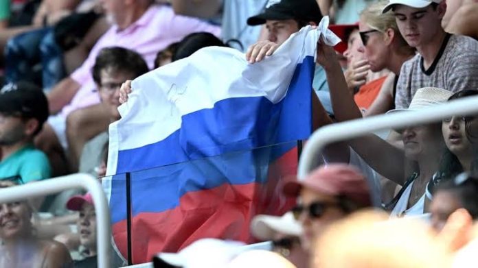 Australian open fans with Russian flag
