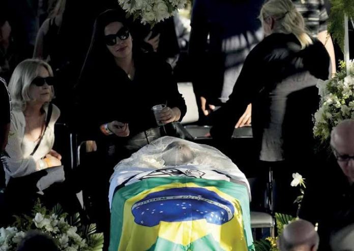 Brazilian soccer great Pele lies in state at Vila Belmiro stadium in