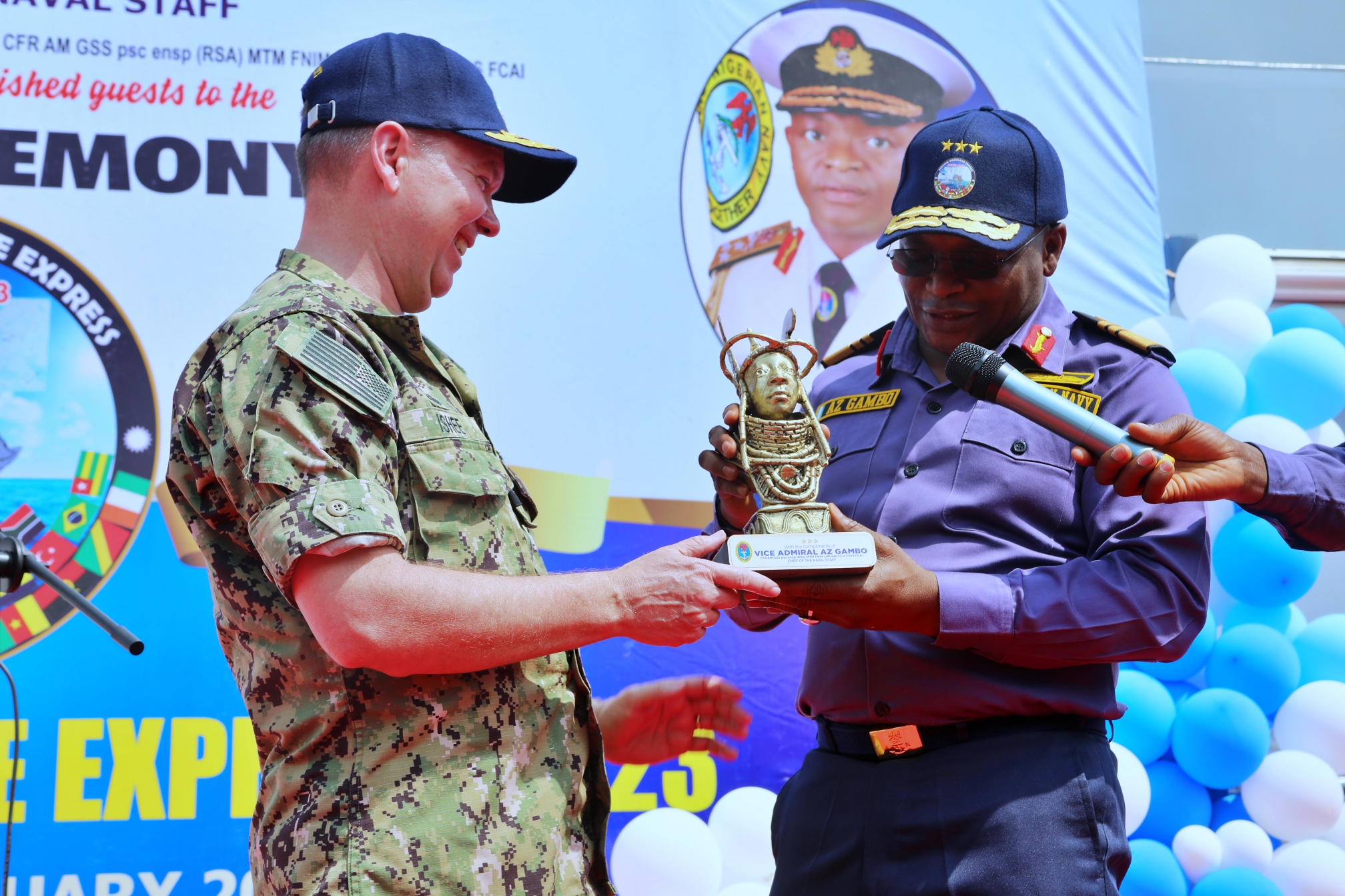 Chief of Naval Staff CNS Vice Admiral Awwal Zubairu Gambo presenting a gift to the United States Navy Vice Admiral Thomas Edward Ishee at the event - THEWILL NEWS MEDIA