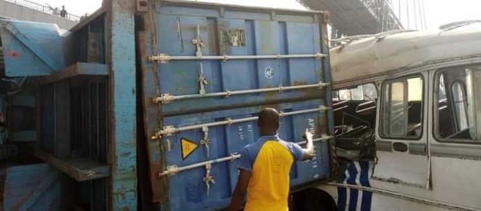 Container crushes bus in Lagos