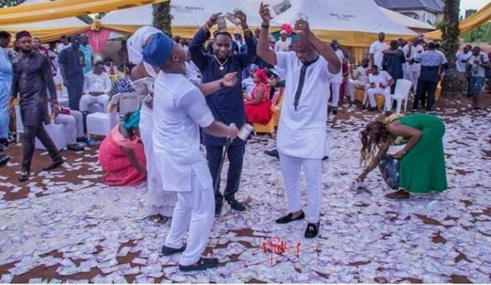 Naira notes being defaced