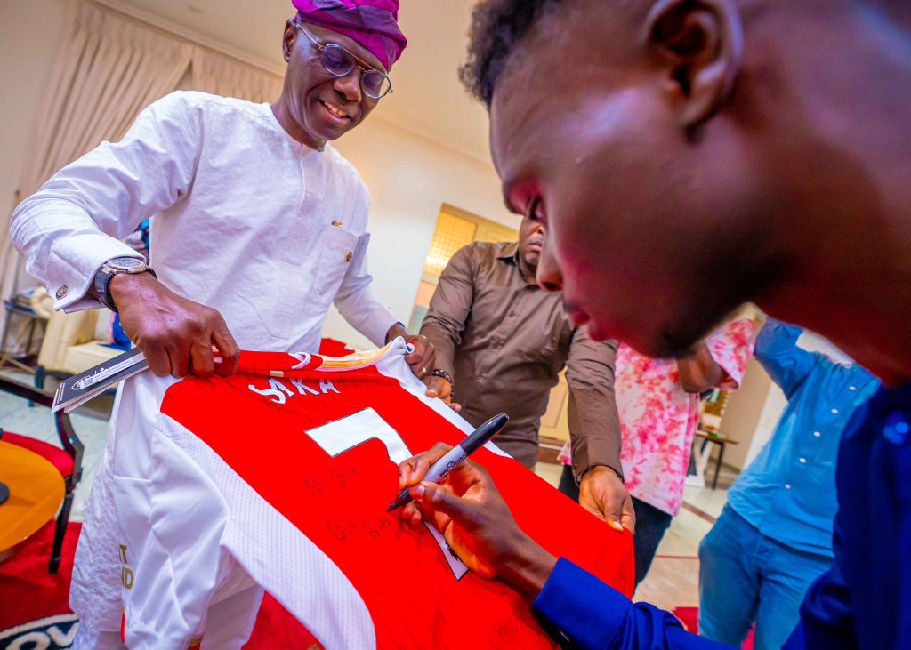 Saka sign Sanwo-olu Arsenal jersey - THEWILL NEWS MEDIA