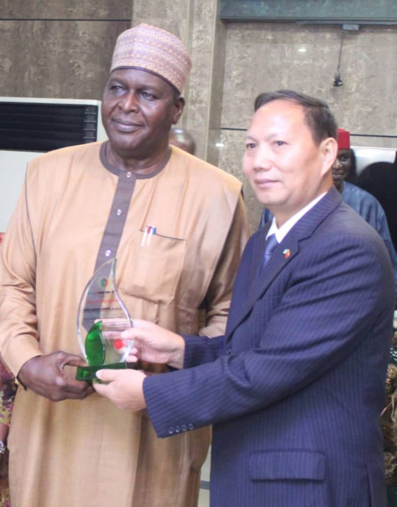 Nigeria -China Business Council Cultural Bridge Builders Recognition Award presented to the Director General, National Council For Art And Culture, Otunba Segun Runsewe by Mr. Wang Guiping of the Chinese Embassy - THEWILL NEWS MEDIA