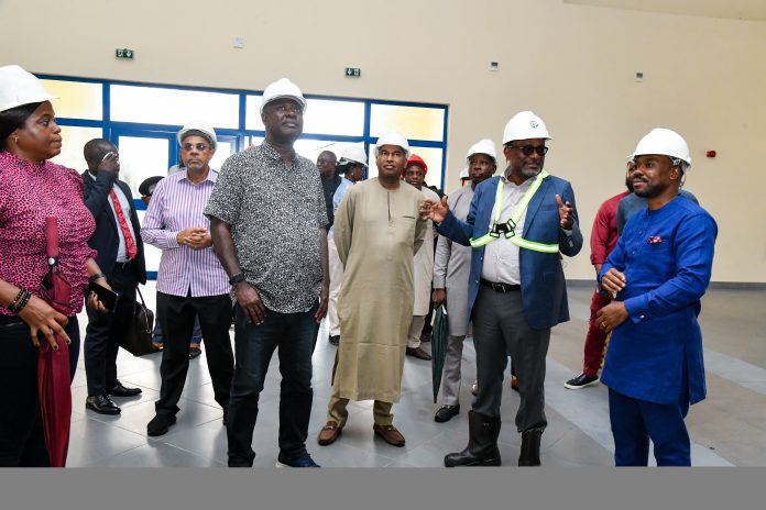 Minister of State for Petroleum Resources (Oil), Senator Heineken Lokpobiri; Executive Secretary, Nigerian Content Development and Monitoring Board (NCDMB), Engr. Simbi Kesiye Wabote; and the Executive Secretary of Petroleum Technology Development Fund (PTDF), Alhaji Aminu Ahmed Galadima, on Wednesday, when the Minister undertook an inspection visit to the Centre for Skills Development and Training (CSDT) at Port Harcourt, Rivers State, initiated by the PTDF, but now co-financed by the NCDMB. Minister of State for Petroleum Resources (Oil), Senator Heineken Lokpobiri; Executive Secretary, Nigerian Content Development and Monitoring Board (NCDMB), Engr. Simbi Kesiye Wabote; and the Executive Secretary of Petroleum Technology Development Fund (PTDF), Alhaji Aminu Ahmed Galadima, on Wednesday, when the Minister undertook an inspection visit to the Centre for Skills Development and Training (CSDT) at Port Harcourt, Rivers State, initiated by the PTDF, but now co-financed by the NCDMB.