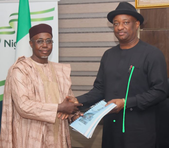 L- R Team leader, task force on the relocation of foreign airlines to the new terminal of MMIA, Hassan Musa, presenting the report of findings to Minister of Aviation and Aerospace Development, Festus Keyamo, in Abuja. L- R Team leader, task force on the relocation of foreign airlines to the new terminal of MMIA, Hassan Musa, presenting the report of findings to Minister of Aviation and Aerospace Development, Festus Keyamo, in Abuja.