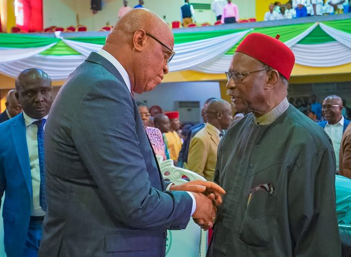 Akwa Ibom State Governor, Pastor Umo Eno and Chief Emeka Anyaoku during the event at Ibom Hall, Uyo.