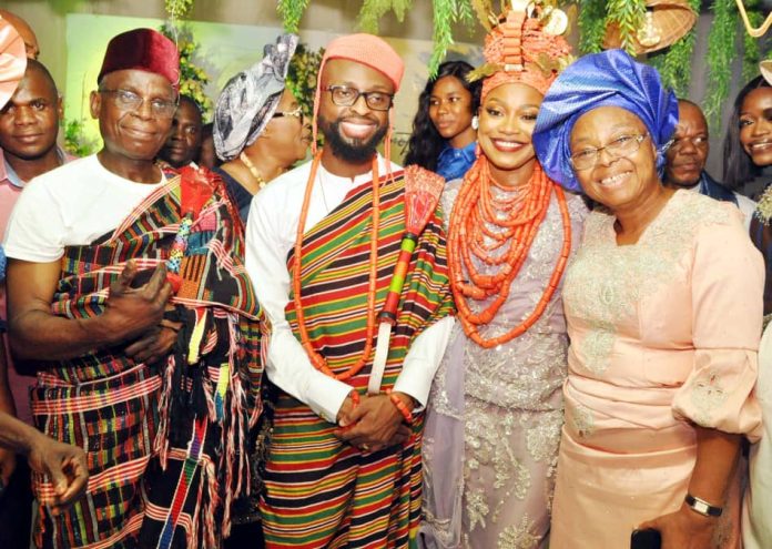 L-R: Father of the groom, Pastor Paul Akhalu; the Groom, Timothy Osahon Akhalu; the Bride, Victory Akhalu and the groom's Mother, Mrs. Katherine Akhalu, during the traditional wedding between Timothy and Victory in Ikeja, Lagos on December 19, 2023.