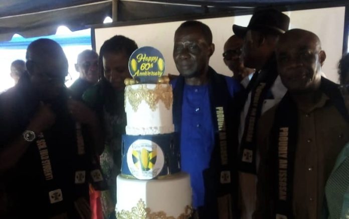 Members of ISSOSA with the Anniversary cake. 2