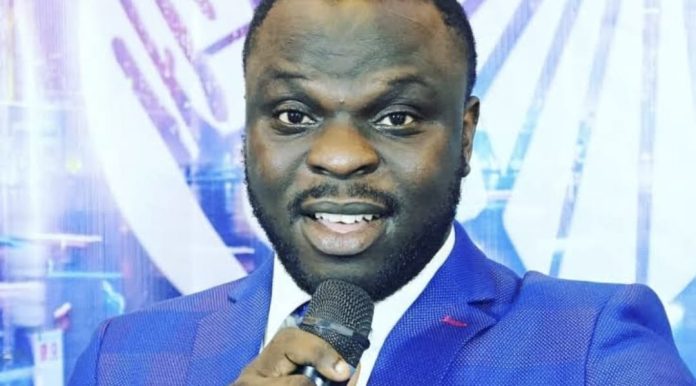 Senior Pastor of Solution Family Church (SFC), Dr. Christian Shola