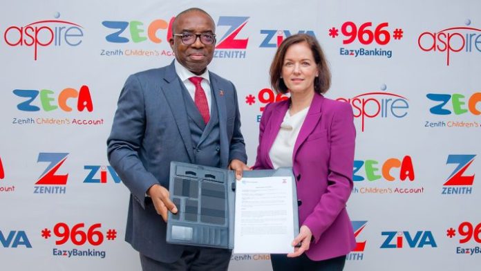 Group Managing Director/CEO, Zenith Bank Plc, Dr. Ebenezer Onyeagwu (left) and the President/Chief Executive Officer, CFA Institute, Margaret Franklin during the signing of an MOU between Zenith Bank and the CFA Institute to develop human capital in finance and investment, recently.