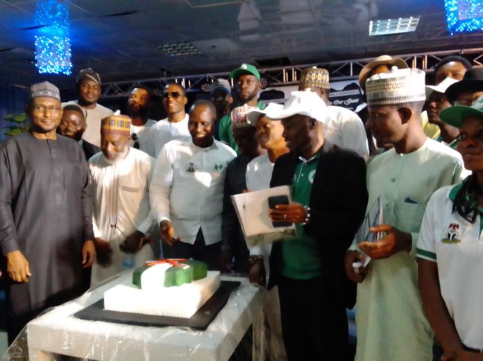 President/Founder of Foundation For Peace and Non-Violence in Nigeria (FOFPEN), Mr Onengiya Erekosima (middle), flanked by participants during the 15-anniversary ceremony held on Saturday, January 27, 2024, at Silverbird Gallery in Abuja, with the theme: “Remaking Nigeria Through Non-Violence.”