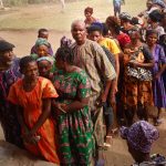 Sokoto Rerun Election Witnesses Large Turnout, Vote Buying Voters filing for accreditation at Ward 11, unit 2 (Holy Child Primary School), Nung Udo Itak, Ikono LGA, during the rerun election on Saturday.