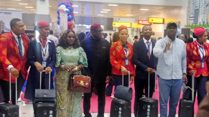Mrs Alice Onyema, Vice Chairman, Sir Peace, (3rd left); Dr Allen Onyema, Chairman (4th left) l; Barr Festus Keyamo, Minister of Aviation and Aerospace Development (2nd right) flanked by some crew members during Air Peace Lagos-London inaugural flight ceremony marking Air Peace entry into the European Continent held at the new terminal of Murtala Muhammed International Airport, Ikeja, Lagos on Friday