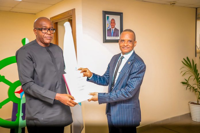 Pic 1: Outgoing Director General, Nigerian Maritime Administration and Safety Agency, NIMASA, Dr Bashir Jamoh, OFR (right) handing over Tenure Report to the Executive Director, Finance and Administration/Acting Director General, Hon. Chudi Offodile, during the Hand-Over Ceremony held at the NIMASA Towers in Victoria Island, Lagos.