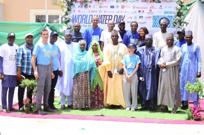 Stakeholders in a group photograph during an event to celebrate 2024 World Water Day. Stakeholders in a group photograph during an event to celebrate 2024 World Water Day.