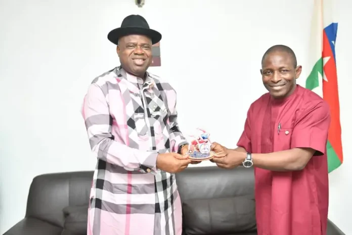 Senator Douye Diri, Governor of Bayelsa State, here being presented a souvenir from the Tunisian Wrestling Federation by Dr. Daniel Igali, Senator Douye Diri, Governor of Bayelsa State, here being presented a souvenir from the Tunisian Wrestling Federation by Dr. Daniel Igali,