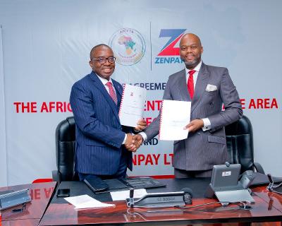 L-R: Chairman of Zenpay Limited, Dr Ebenezer Onyeagwu and the Secretary-General of the African Continental Free Trade Area (AfCFTA) Secretariat, His Excellency Wamkele Mene, during the signing of an agreement for the development and deployment of the SMARTAfCFTA Portal to facilitate trade within the African continent, at Zenith Bank Headquarters, Ajose Adeogun Street, Victoria Island, Lagos on Friday.
