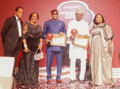 L-R: Mr Donald Duke, Former Governor of Cross River State; Mrs Alice Onyema, Vice Chairman, Air Peace; Dr Allen Onyema, Chairman, Air Peace; Hon. Olubunmi Tunji-Ojo, Minister of Interior; and Mrs Rita Amuka, wife of Vanguard publisher, Sam Amuka, at the recently held Vanguard Newspaper Awards in Lagos. L-R: Mr Donald Duke, Former Governor of Cross River State; Mrs Alice Onyema, Vice Chairman, Air Peace; Dr Allen Onyema, Chairman, Air Peace; Hon. Olubunmi Tunji-Ojo, Minister of Interior; and Mrs Rita Amuka, wife of Vanguard publisher, Sam Amuka, at the recently held Vanguard Newspaper Awards in Lagos.