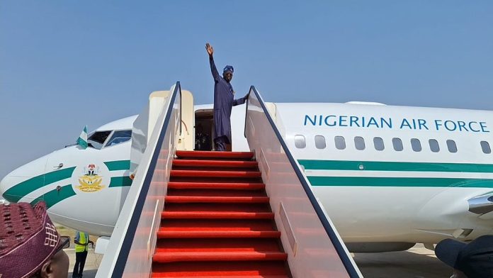 Tinubu waves