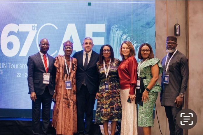 L-R Yusuf Abdul-Rauf, Charge d’ Affaires, Nigeria High Commission, Zambia; Lai Mohammed, Former Minister of Information and Culture and Special Adviser to UN Secretary-General; Zurab Pololikashvili, Secretary General, UN Tourism; Lola Ade-John, Minister of Tourism; Elcia Grandcourt, Director, UN Tourism Regional Dept. for Africa; Dorothy Duruaku, Director, Int. Tourism Relations & Coop; and Ernest Ugah, Minister Counselor Nigeria High Commission Zambia. L-R Yusuf Abdul-Rauf, Charge d’ Affaires, Nigeria High Commission, Zambia; Lai Mohammed, Former Minister of Information and Culture and Special Adviser to UN Secretary-General; Zurab Pololikashvili, Secretary General, UN Tourism; Lola Ade-John, Minister of Tourism; Elcia Grandcourt, Director, UN Tourism Regional Dept. for Africa; Dorothy Duruaku, Director, Int. Tourism Relations & Coop; and Ernest Ugah, Minister Counselor Nigeria High Commission Zambia.