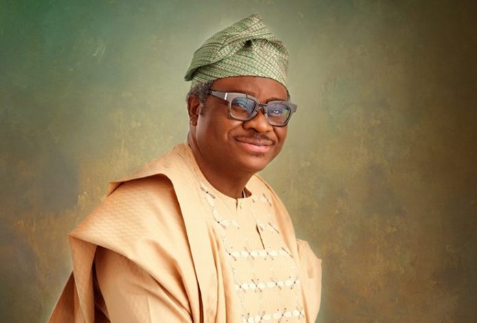 Dr Kola Adesina