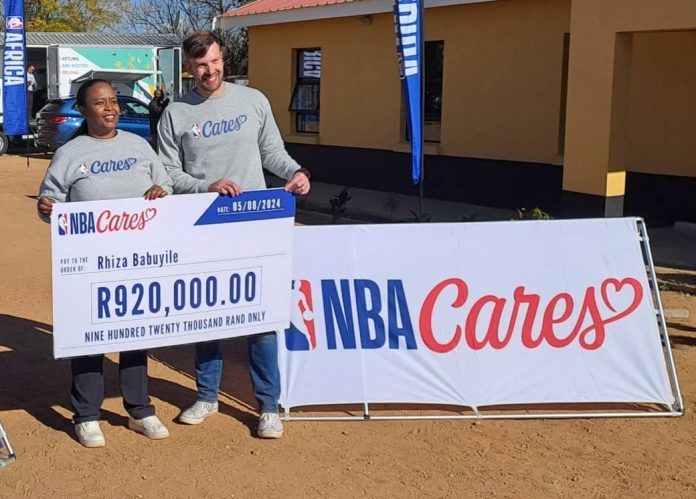 NBA representative during the donation of $50,000 in support of Rizha Babuyile community development initiative in Johannesburg, South Africa. NBA representative during the donation of $50,000 in support of Rizha Babuyile community development initiative in Johannesburg, South Africa.