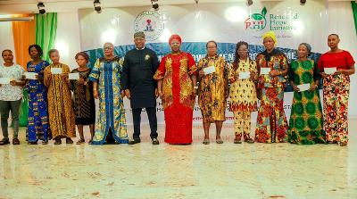Pic of the representative of the wife of the president, Representative of the Governor of Akwa Ibom State, Representative of the wife of the Governor of Akwa Ibom State, with some beneficiaries of RHI EERP in Uyo, Akwa Ibom State yesterday.