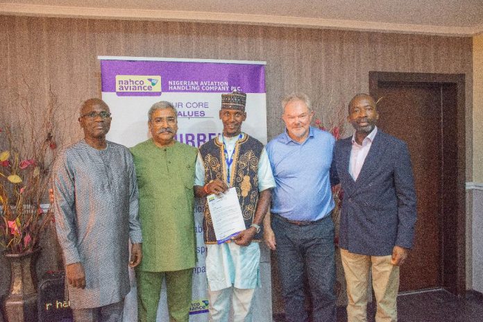 L-R: CFO, Mr. Adeoye Emiloju; GMD/CEO, Mr. Indranil Gupta; the staff, Mr. Auwal Dankode; COO, Mr. Didier Steullet and GED, Dr. Sola Obabori, all of NAHCO Plc at the event to appreciate Dankode at the company’s head office in Lagos. L-R: CFO, Mr. Adeoye Emiloju; GMD/CEO, Mr. Indranil Gupta; the staff, Mr. Auwal Dankode; COO, Mr. Didier Steullet and GED, Dr. Sola Obabori, all of NAHCO Plc at the event to appreciate Dankode at the company’s head office in Lagos.