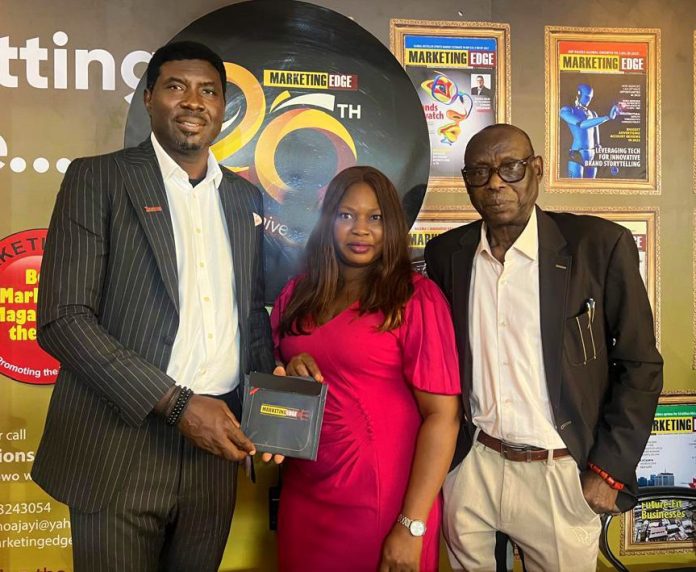 Meka Niyi Olowola, Managing Partner of Zenera Consulting, being congratulated on winning the Edge Awards’ Brand Strategist of the Decade by Ogechi Odigbo, General Manager, Marketing at Marketing Edge; and John Ajayi, CEO of Marketing Edge, recently in Lagos. Meka Niyi Olowola, Managing Partner of Zenera Consulting, being congratulated on winning the Edge Awards’ Brand Strategist of the Decade by Ogechi Odigbo, General Manager, Marketing at Marketing Edge; and John Ajayi, CEO of Marketing Edge, recently in Lagos.
