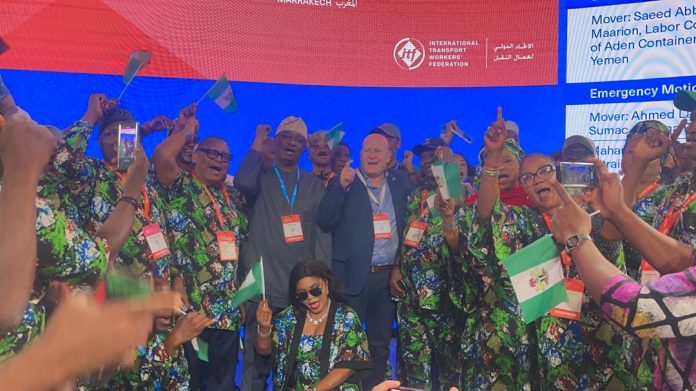 Keyamo Morocco The Honourable Minister of Aviation and Aerospace Development, Festus Keyamo (middle) flanked by labour leaders in the Congress.